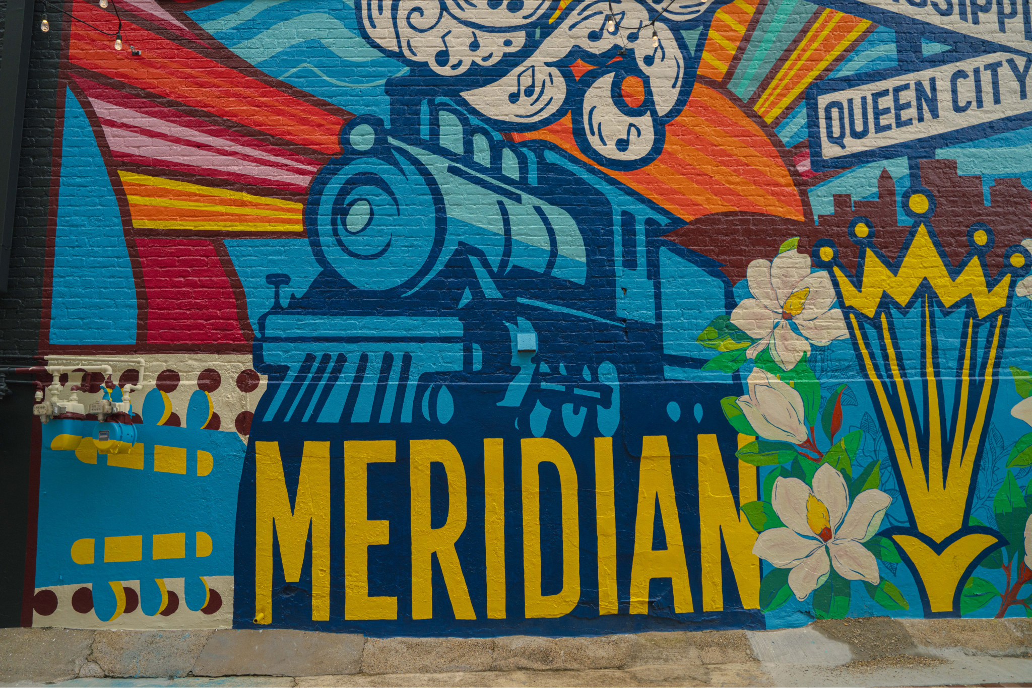 Queen City railroad mural in downtown Meridian
